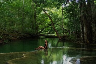 Lesser Sunda Island Sumbawa: Woman at pool of Mata Jitu waterfall