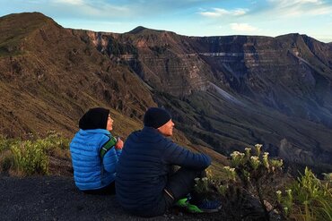 A couple enjoys the view from Gunung Tambora, Indonesian island of Sumbawa