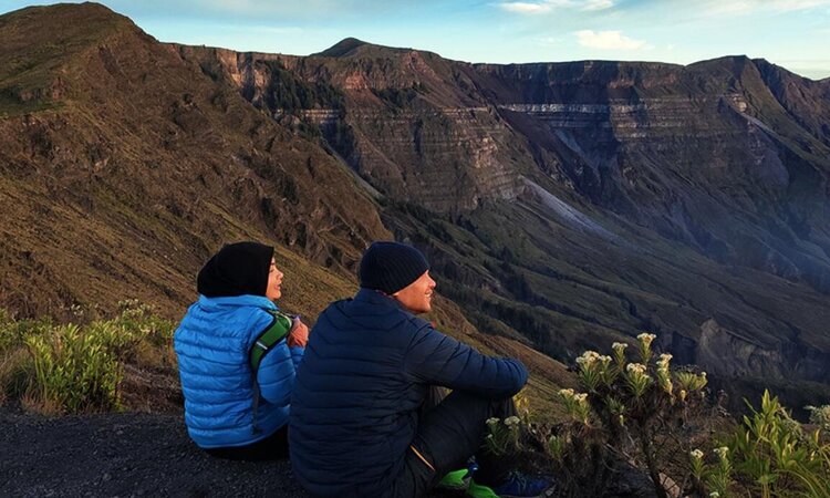 A couple enjoys the view from Gunung Tambora, Indonesian island of Sumbawa