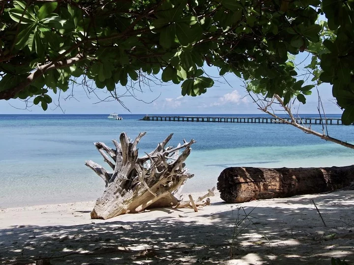 Selayar Dive Resort, South Sulawesi: White sand beach with jetty views