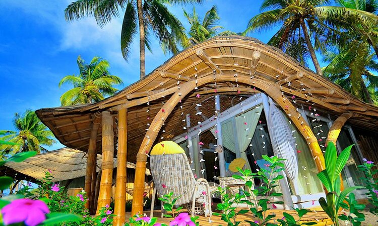 Beach bungalow with terrace in the Coconut Garden Beach Resort, Flores Island/Indonesia