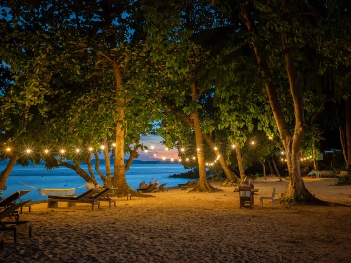 Illuminated Murex Resort Bangka Beach at Night