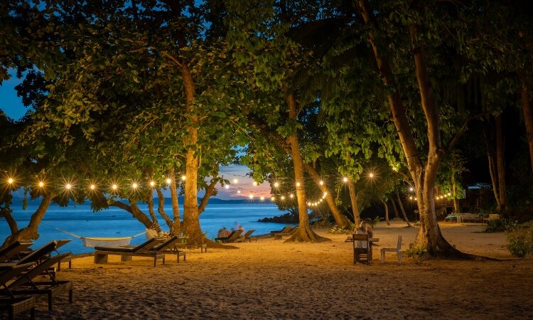 Illuminated Murex Resort Bangka Beach at Night