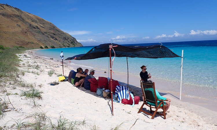 Relaxing on remote Island along route in Indonesia East of the Wallace Line