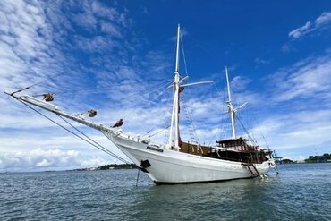 Sailing boat Katharina cruising through Indonesia East of the Wallace Line