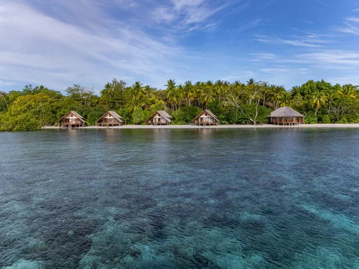 Moluccas - Halmahera: Kusu Island Resort - Bungalows east side with restaurant