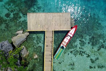 Sulawesi, Labengki island: Colourful boat at pier