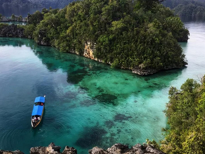 Sulawesi, Labengki island: Boat in lonely bay