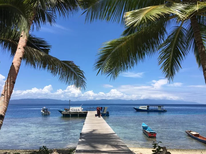 Sali Bay Resort, Moluccas: Resort Jetty with Dive Boats