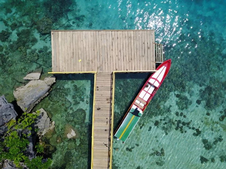 Sulawesi, Labengki island: Colourful boat at pier