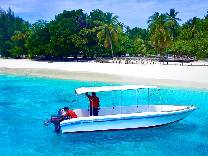  Agusta Eco Resort dive boat near resort beach