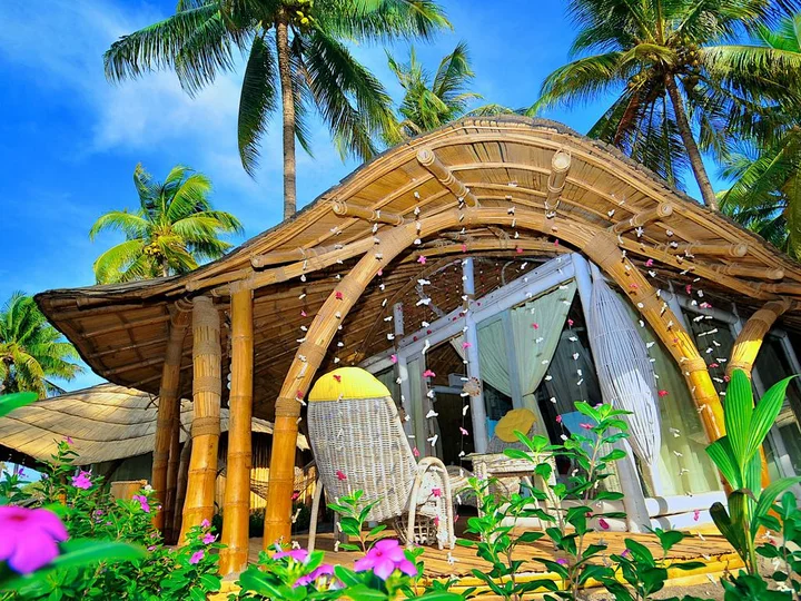Beach bungalow with terrace in the Coconut Garden Beach Resort, Flores Island/Indonesia
