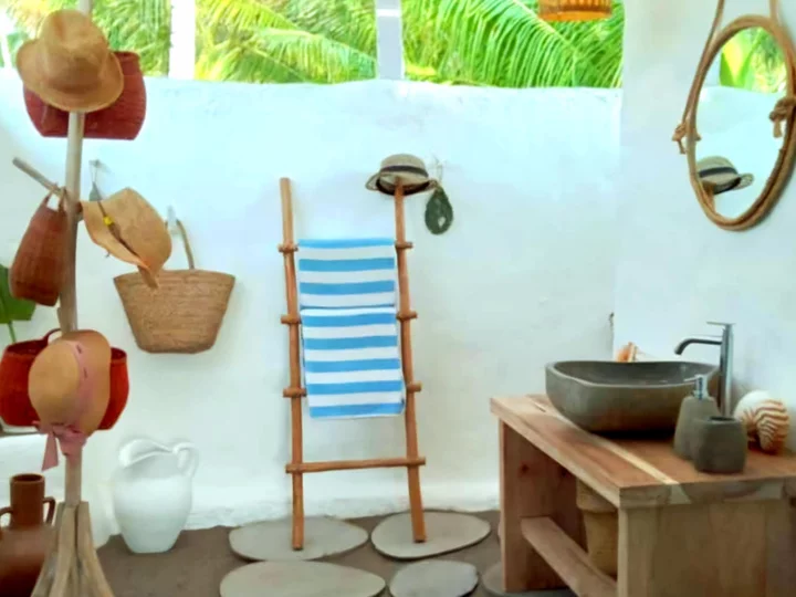 Beach House bathroom in Coconut Garden Beach Resort, Flores Island