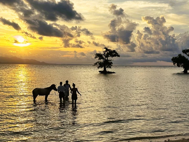 Indonesia, Sumbawa island: Sunset at beach in Sumbawa Besar