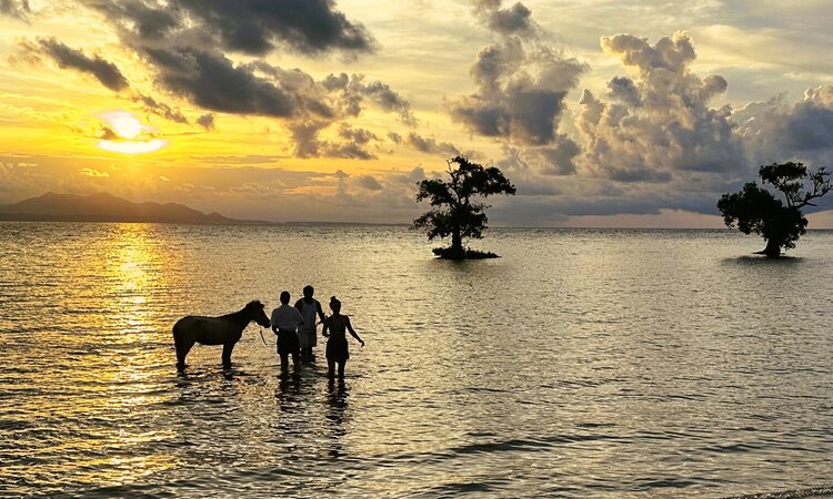 Indonesia, Sumbawa island: Sunset at beach in Sumbawa Besar