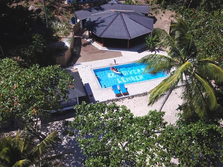 Sulawesi: White Sands Beach Resort Lembeh - Resort pool & restaurant