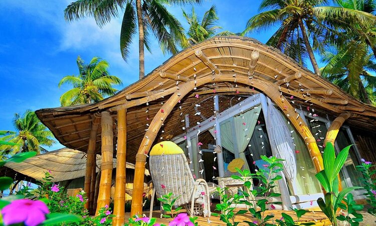 Beach bungalow with terrace in the Coconut Garden Beach Resort, Flores Island/Indonesia