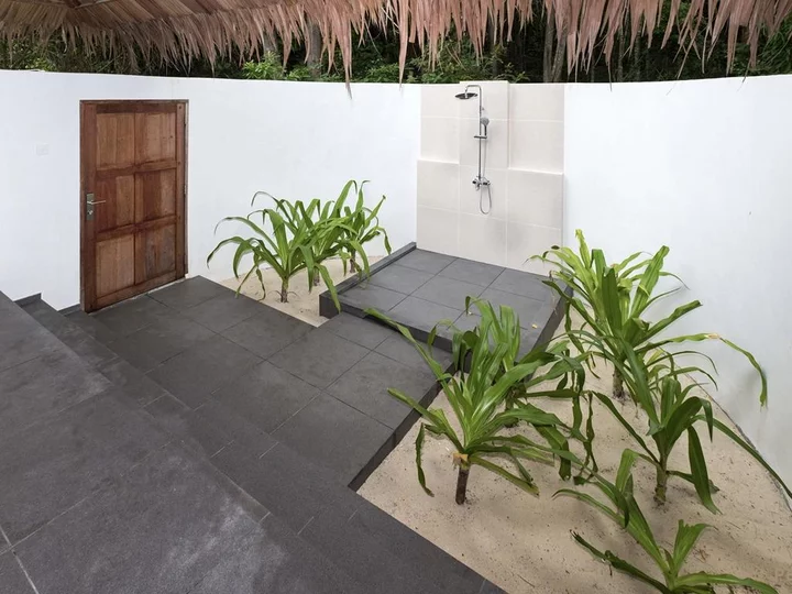 Deluxe Beach Bungalow Bath at Selayar Dive Resort, South Sulawesi