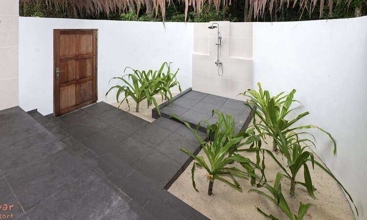 Deluxe Beach Bungalow Bath at Selayar Dive Resort, South Sulawesi