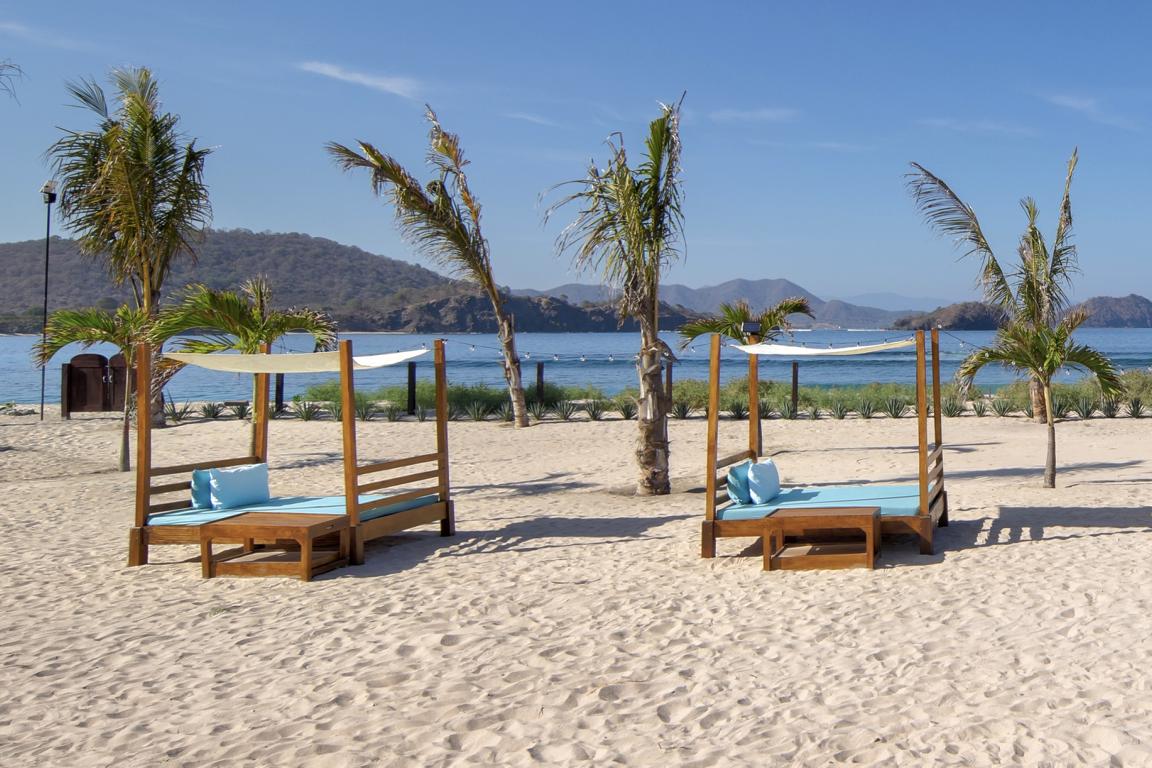 Beach beds with direct sea views, Mocean Dive Resort, Sumbawa Island