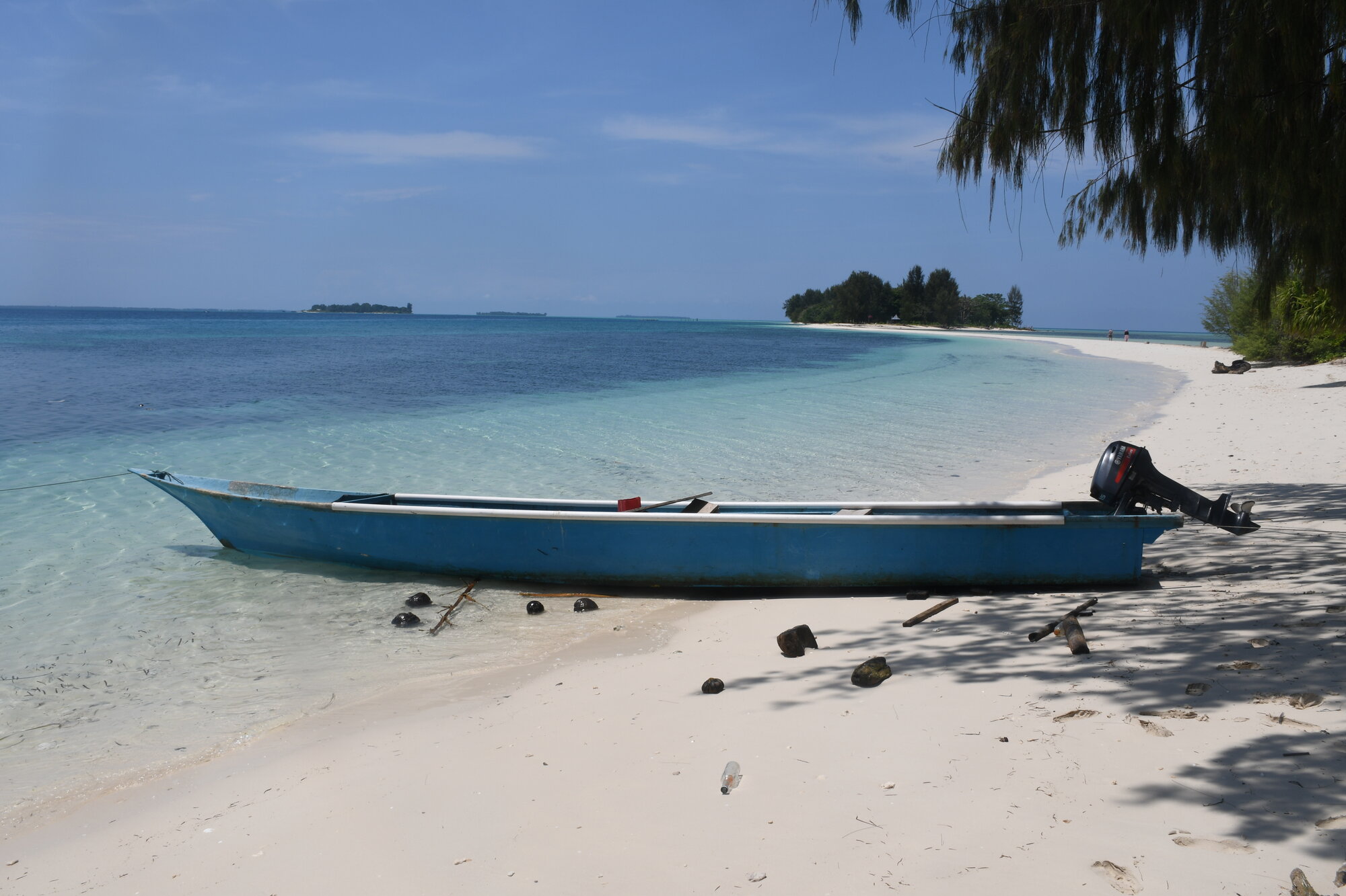 Dodola Island, Morotai: Boat on white sandy beach