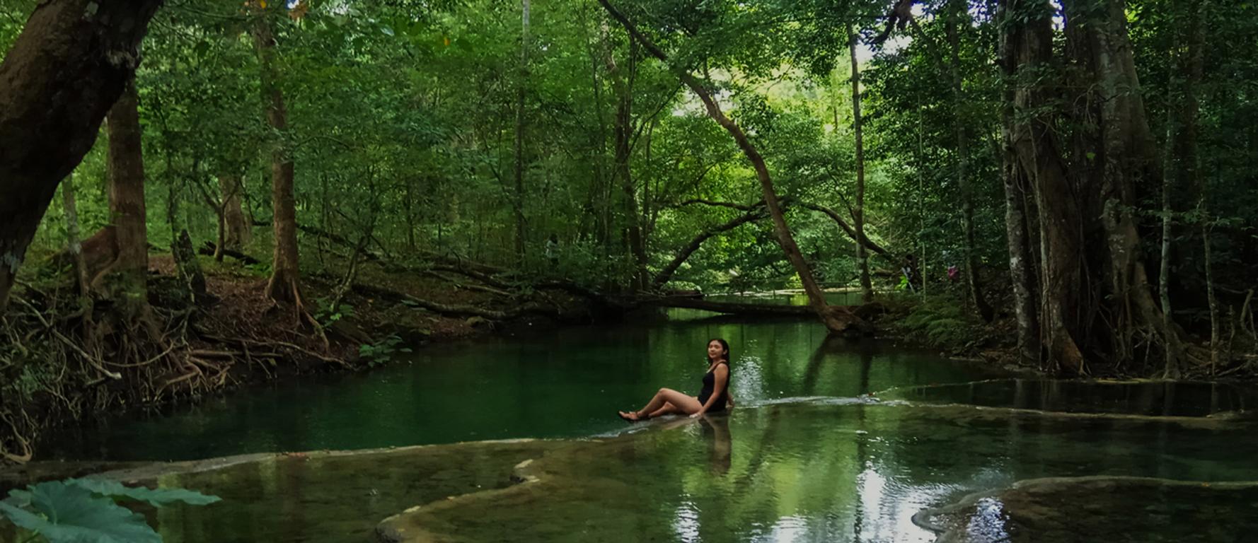 Lesser Sunda Island Sumbawa: Woman at pool of Mata Jitu waterfall